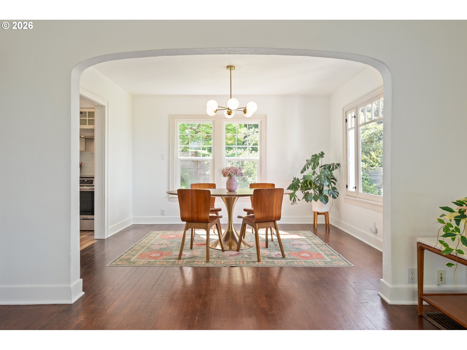 2219 City View Street Eugene, OR 97405 - Photo 7 of 48 a view of a dining room with furniture window and wooden floor