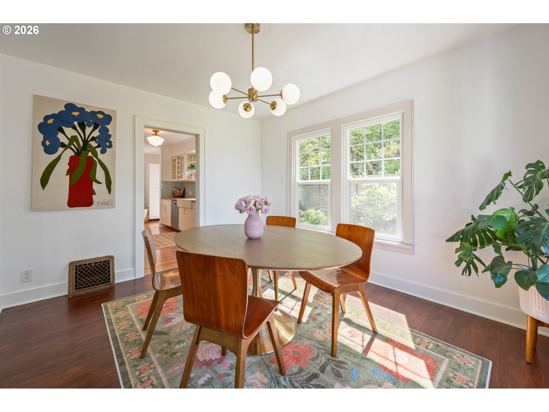2219 City View Street Eugene, OR 97405 - Photo 8 of 48 a view of a dining room with furniture and wooden floor