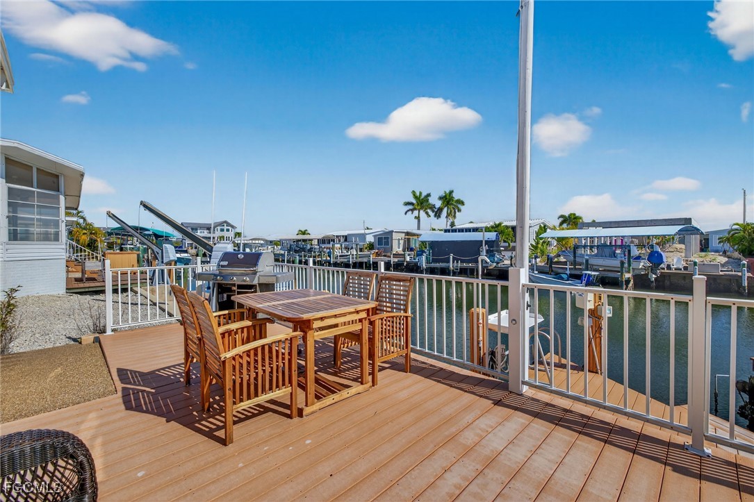 3088 Skipper Lane St. James City, FL 33956 - Photo 34 of 43 a outdoor view with a sitting space