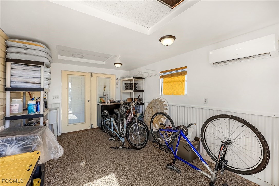 3088 Skipper Lane St. James City, FL 33956 - Photo 36 of 43 a view of a room with gym equipment