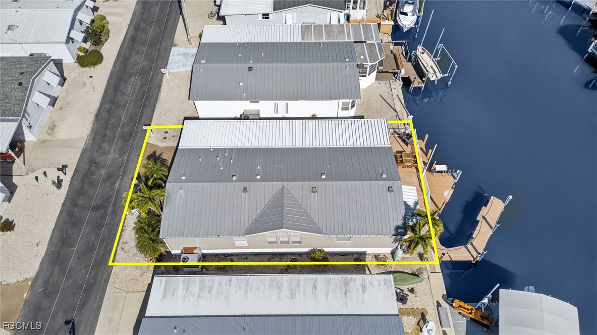 3088 Skipper Lane St. James City, FL 33956 - Photo 41 of 43 an aerial view of residential houses with outdoor space