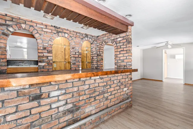 a bathroom with a sink and a shower
