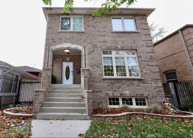 a view of a house with a large windows