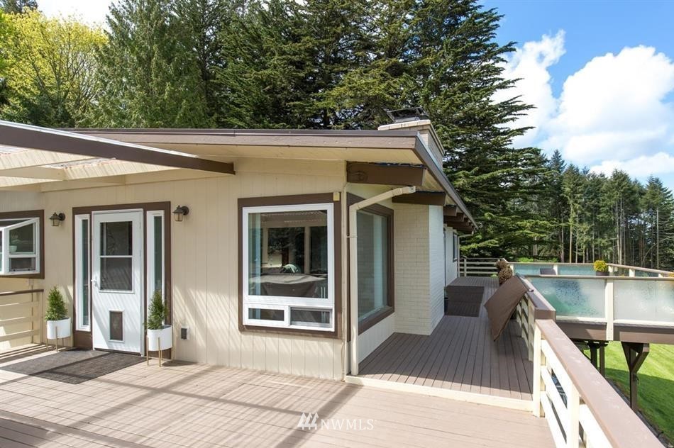744 Miller Road Sequim, WA 98382 - Photo 13 of 40 a view of a house with backyard