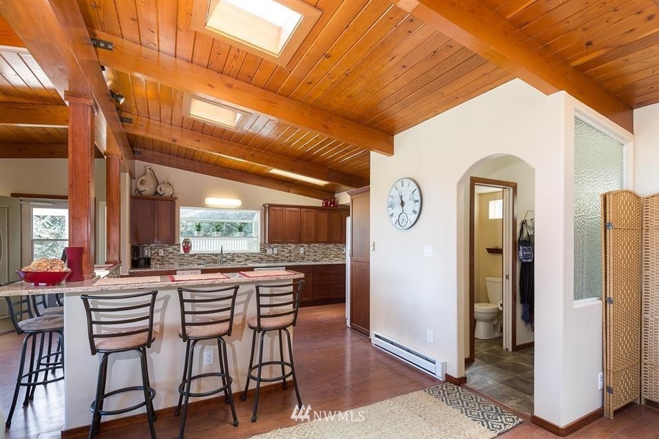 744 Miller Road Sequim, WA 98382 - Photo 21 of 40 a dining room with furniture and window
