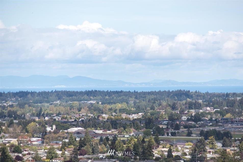 744 Miller Road Sequim, WA 98382 - Photo 3 of 40 an aerial view of residential houses with outdoor space