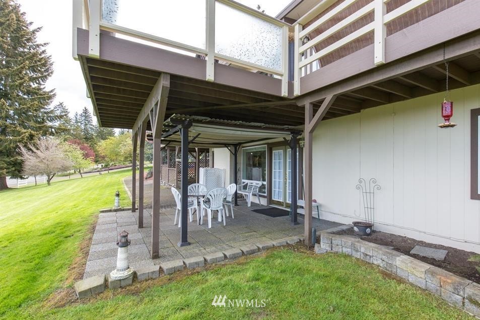 744 Miller Road Sequim, WA 98382 - Photo 36 of 40 a view of a chairs and table in the patio