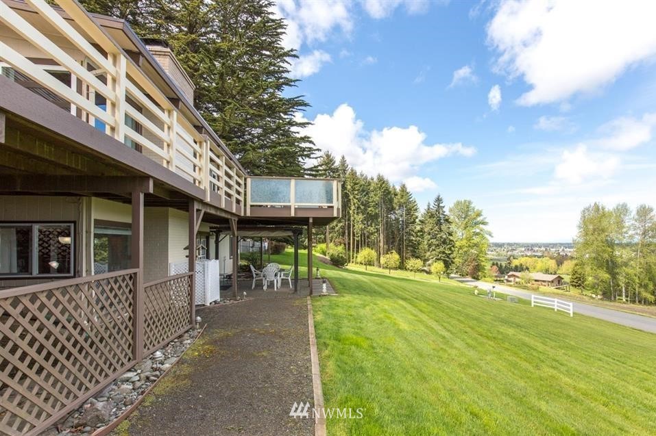 744 Miller Road Sequim, WA 98382 - Photo 37 of 40 a front view of a house with a yard