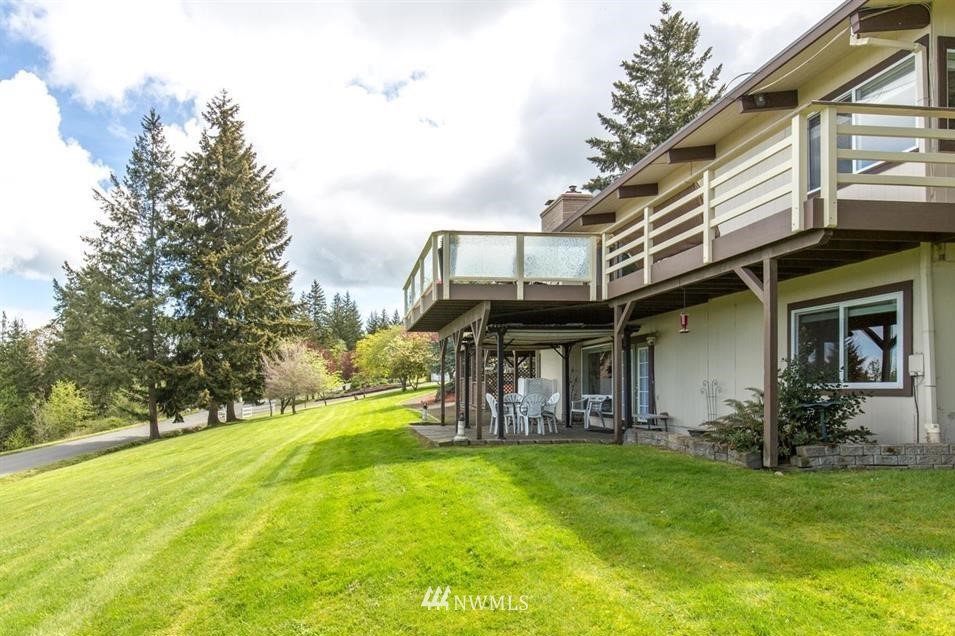 744 Miller Road Sequim, WA 98382 - Photo 38 of 40 a view of a house with a yard