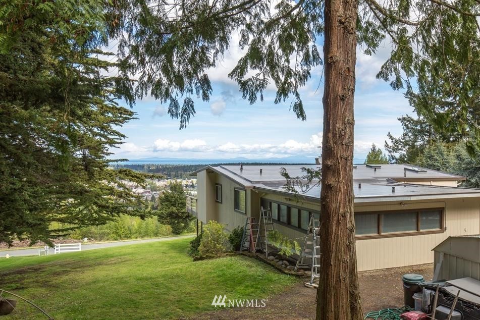 744 Miller Road Sequim, WA 98382 - Photo 6 of 40 a view of house with a yard