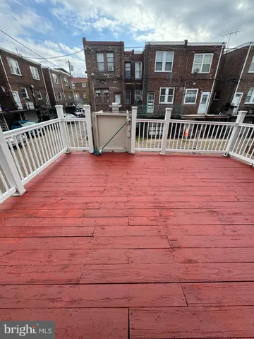 a view of a house with deck