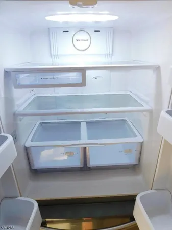 a view of hallway with walk in closet