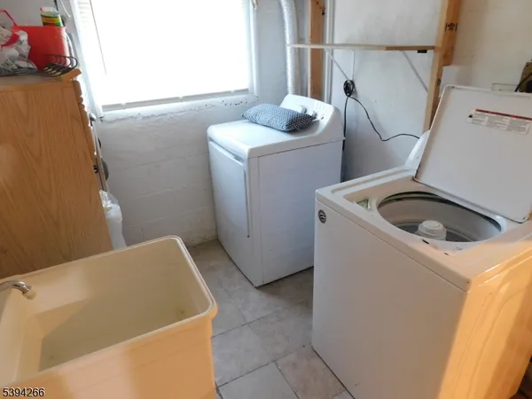 a bathroom with a mirror and a shower