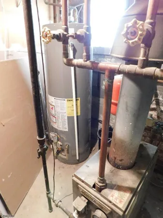 a view of a hallway with wooden floor and glass door