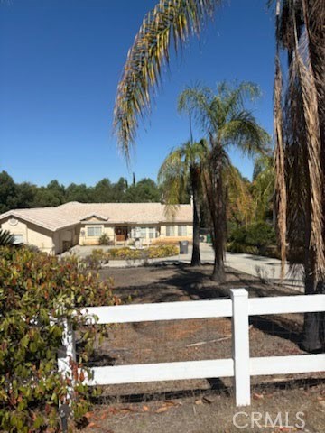14350 Sunset Ridge Road Riverside, CA 92503 - Photo 2 of 5 a view of a yard with palm tree