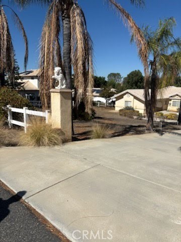 14350 Sunset Ridge Road Riverside, CA 92503 - Photo 3 of 5 a view of road with card