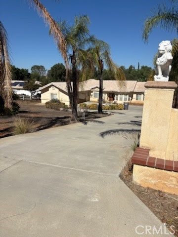 14350 Sunset Ridge Road Riverside, CA 92503 - Photo 4 of 5 a view of swimming pool with outdoor seating
