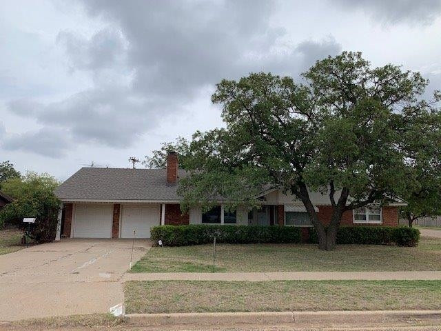 1502 Ave K Ralls, TX 79357 - Photo 2 of 23 front view of a house with a tree