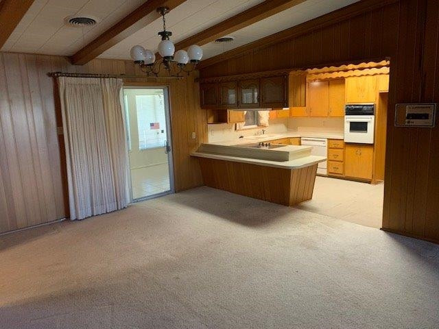 1502 Ave K Ralls, TX 79357 - Photo 7 of 23 a large room with a large window and a glass table in a room