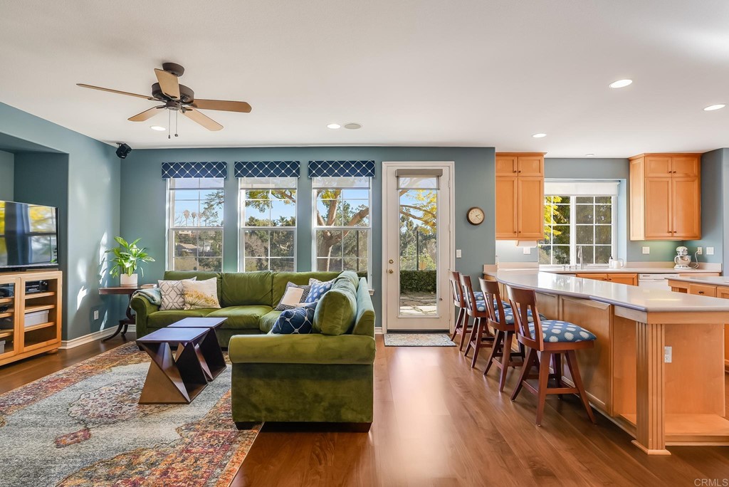 8046 Calle Pinon Carlsbad, CA 92009 - Photo 13 of 51 a living room with furniture and a large window