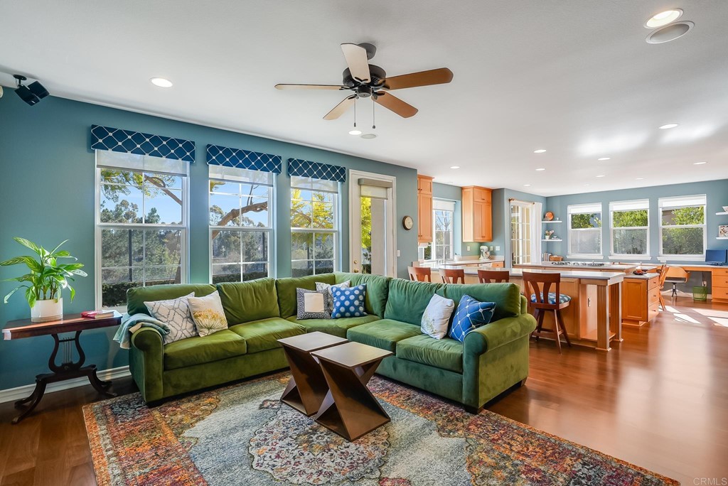 8046 Calle Pinon Carlsbad, CA 92009 - Photo 15 of 51 a living room with furniture and a large window