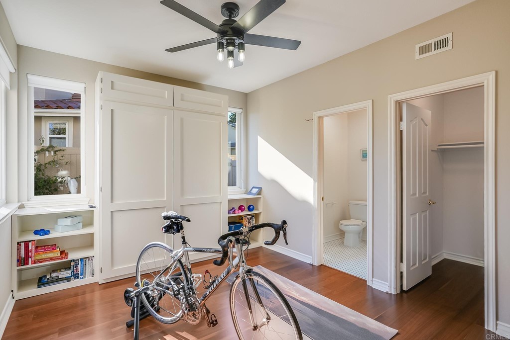 8046 Calle Pinon Carlsbad, CA 92009 - Photo 21 of 51 a view of a room with gym equipment