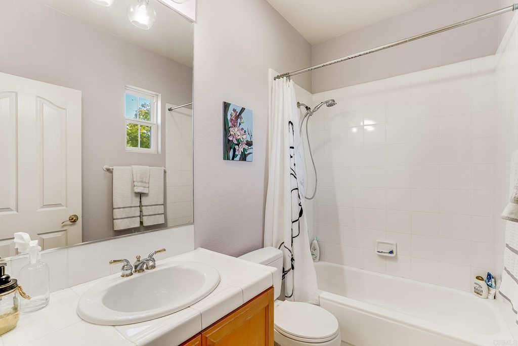 8046 Calle Pinon Carlsbad, CA 92009 - Photo 40 of 51 a bathroom with a sink toilet and shower