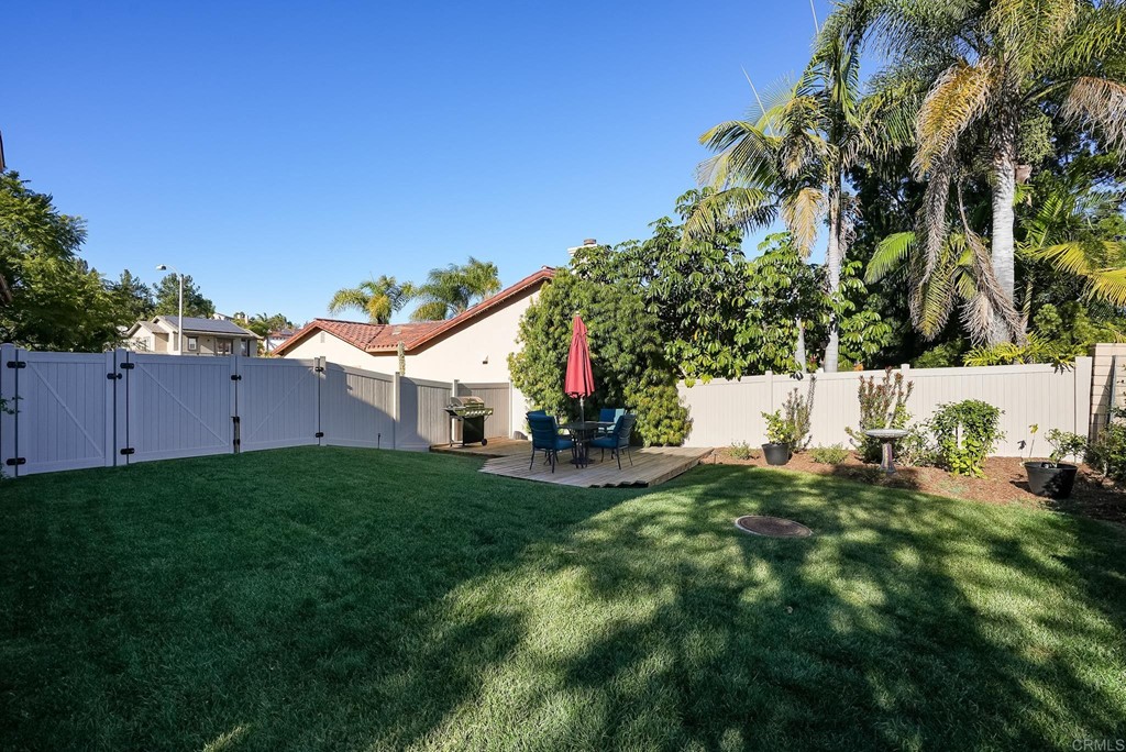 8046 Calle Pinon Carlsbad, CA 92009 - Photo 45 of 51 a view of backyard with small cabin
