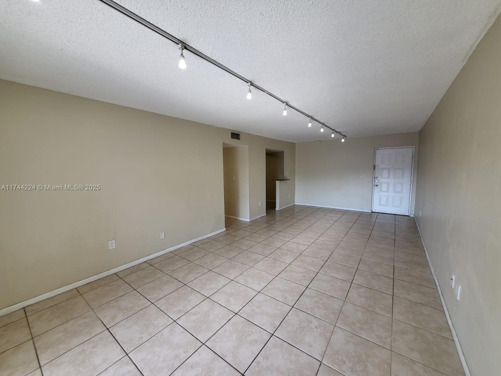 711 North Pine Island Road, Unit 407 Plantation, FL 33324 - Photo 3 of 11 a view of an empty room