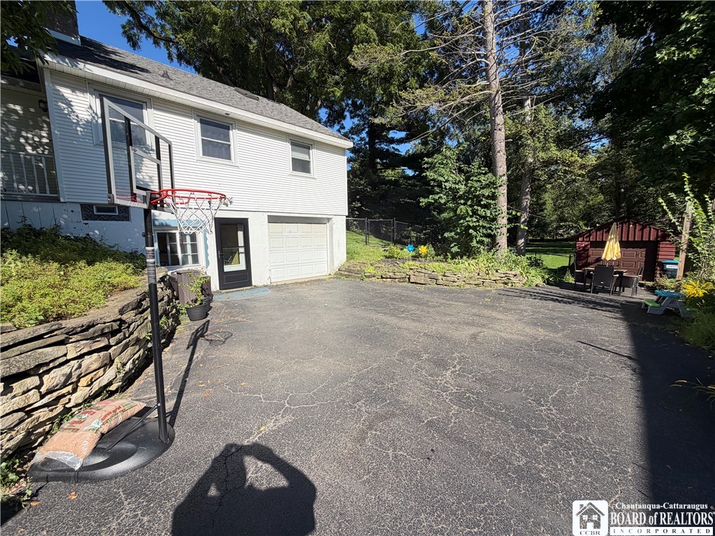18 Risley Street Pomfret, NY 14063 - Photo 34 of 40 Driveway with basement access and 2nd detached garage