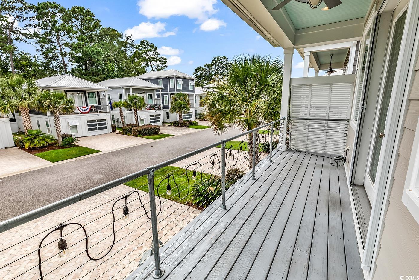 202 Clam Digger Loop Pawleys Island, SC 29585 - Photo 22 of 28 Balcony featuring a residential view and a ceiling