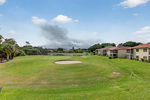 a view of a house with a big yard