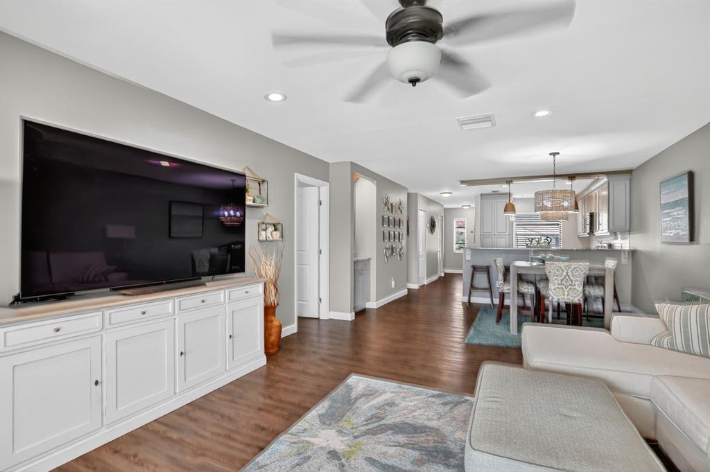 21219 Lago Circle, Unit J5 Boca Raton, FL 33433 - Photo 19 of 46 a living room with furniture and a flat screen tv