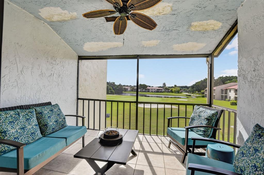 21219 Lago Circle, Unit J5 Boca Raton, FL 33433 - Photo 33 of 46 a view of a balcony with furniture