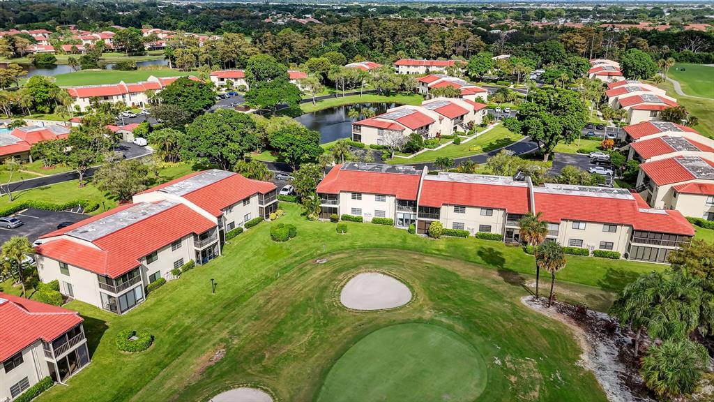 21219 Lago Circle, Unit J5 Boca Raton, FL 33433 - Photo 43 of 46 an aerial view of residential houses with outdoor space and street view