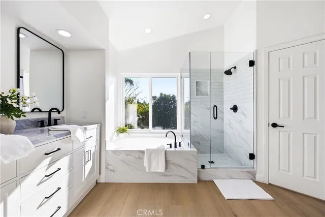 a view of a patio with a table and chairs