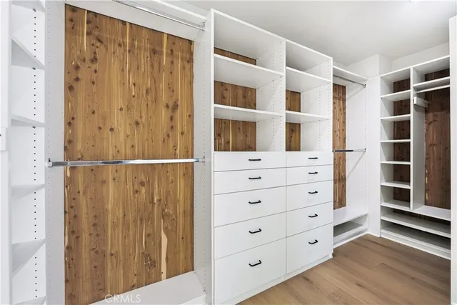 a swimming pool with outdoor seating and yard