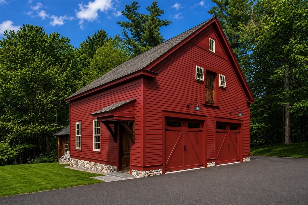 360 Teel Road Winchendon, MA 01475 - Photo 5 of 42 a front view of a house with garden