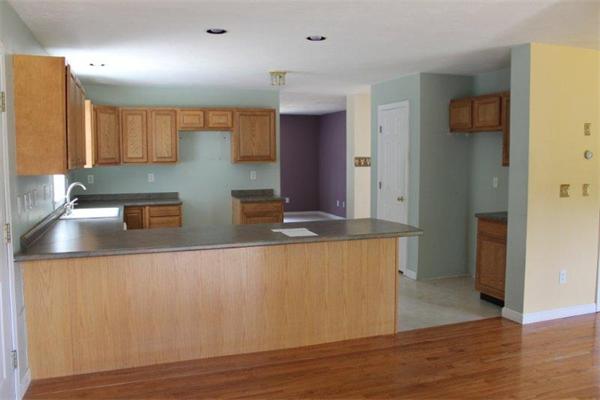 37 Halfrey Road Hubbardston, MA 01452 - Photo 3 of 26 a kitchen with stainless steel appliances granite countertop a sink a stove and a refrigerator