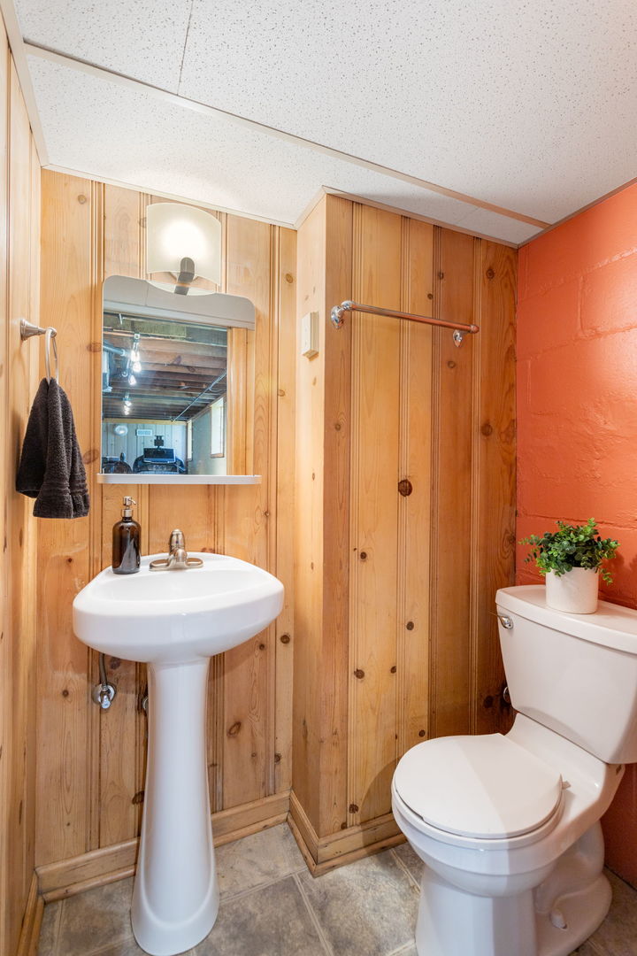 342 Lawton Road Riverside, IL 60546 - Photo 21 of 33 a bathroom with a sink toilet and shower