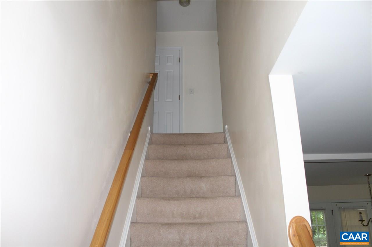 29 Riverside Drive Palmyra, VA 22963 - Photo 13 of 29 a view of staircase with white walls and white door