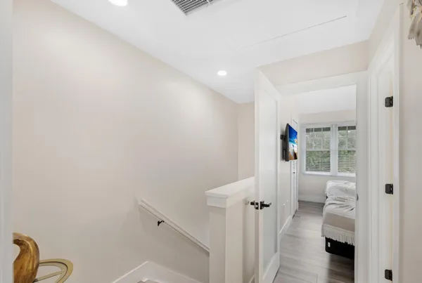 a view of a balcony with furniture