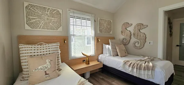 a bedroom with bed and a window