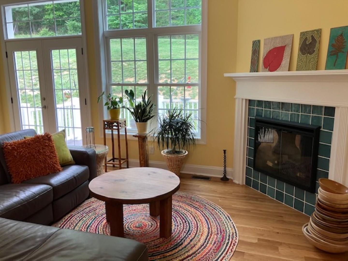1203 Stocker Street Staunton, VA 24401 - Photo 11 of 35 a living room with furniture and a fireplace