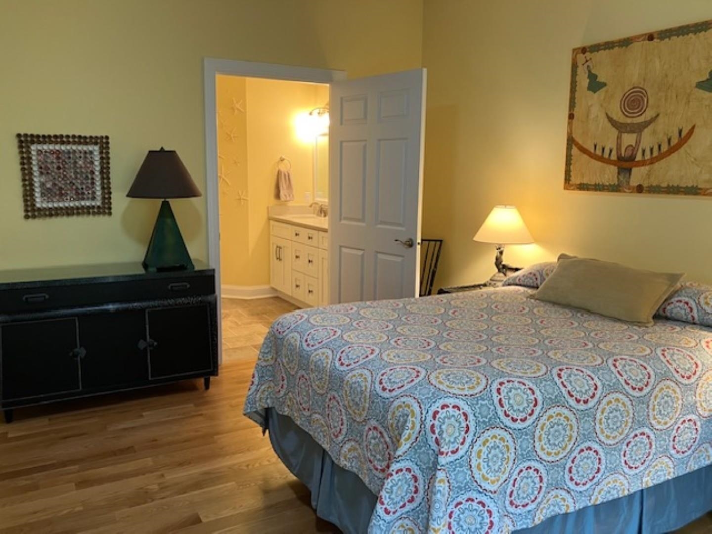 1203 Stocker Street Staunton, VA 24401 - Photo 15 of 35 a bedroom with a bed and wooden floor
