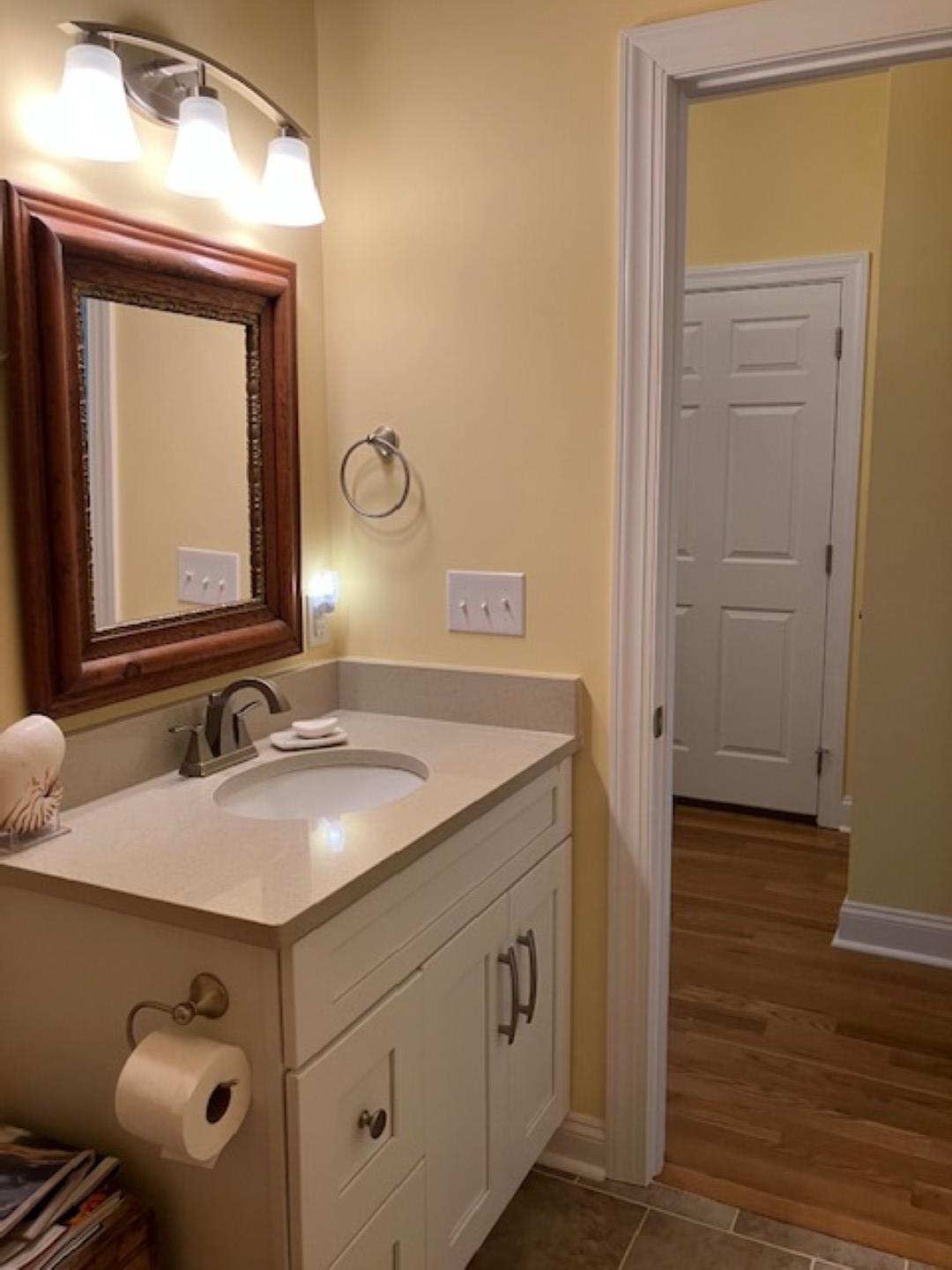 1203 Stocker Street Staunton, VA 24401 - Photo 28 of 35 a bathroom with a granite countertop sink and a mirror