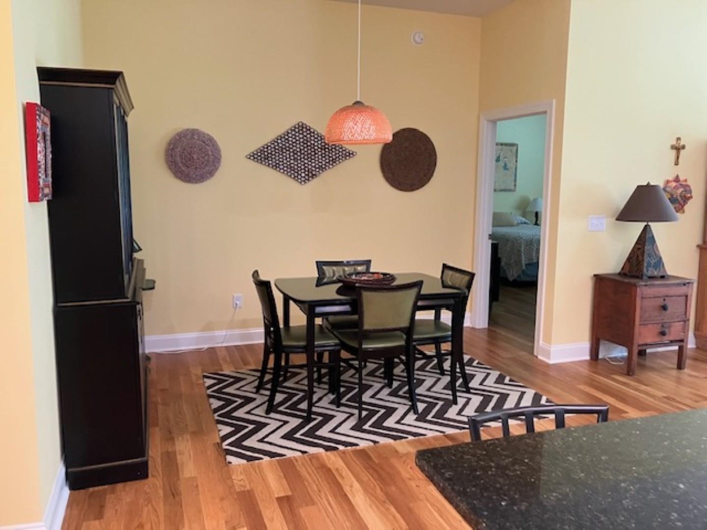 1203 Stocker Street Staunton, VA 24401 - Photo 9 of 35 a view of a dining room with furniture and wooden floor