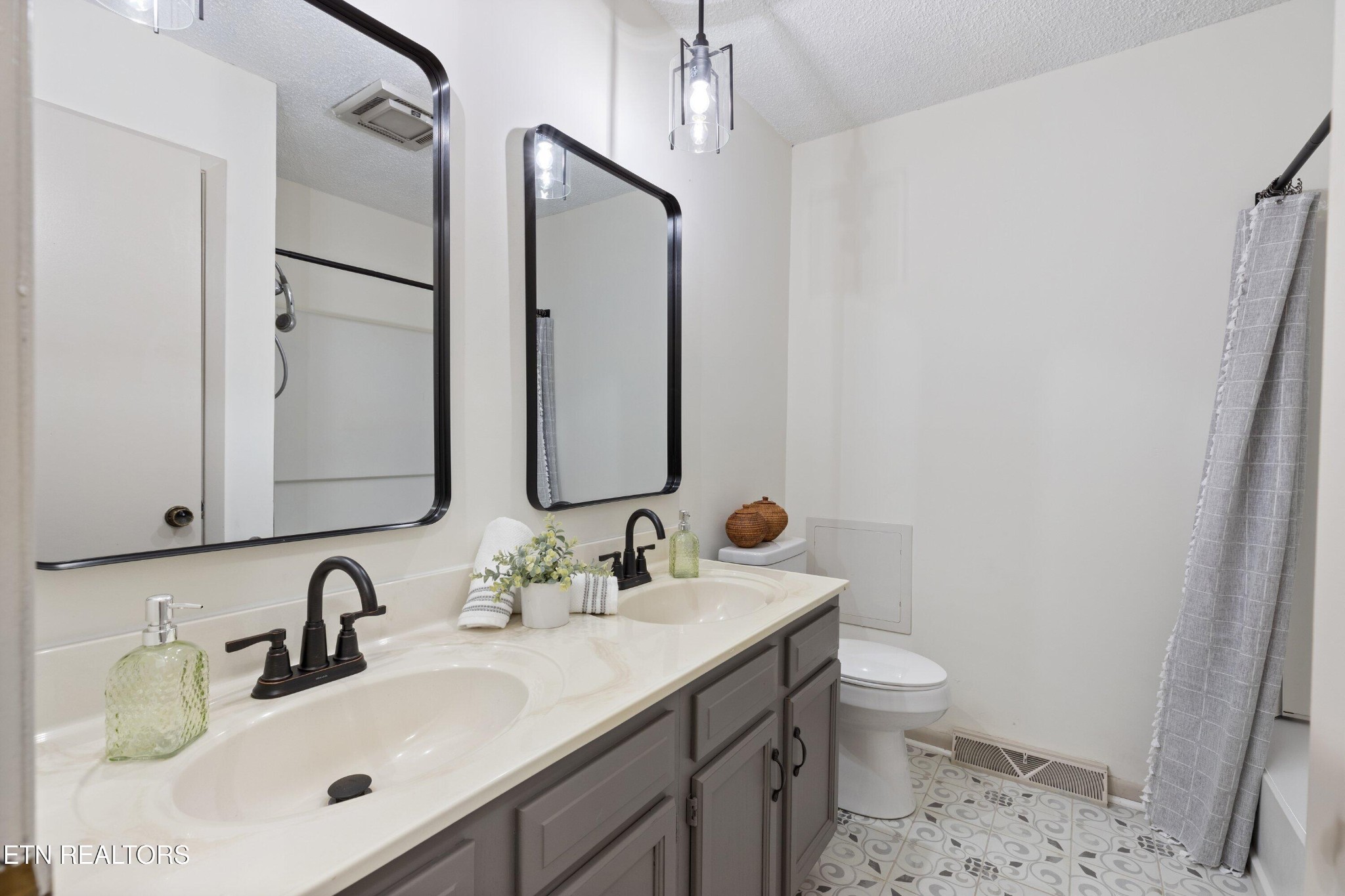 912 Naples Road Knoxville, TN 37923 - Photo 14 of 49 a bathroom with a sink toilet and shower