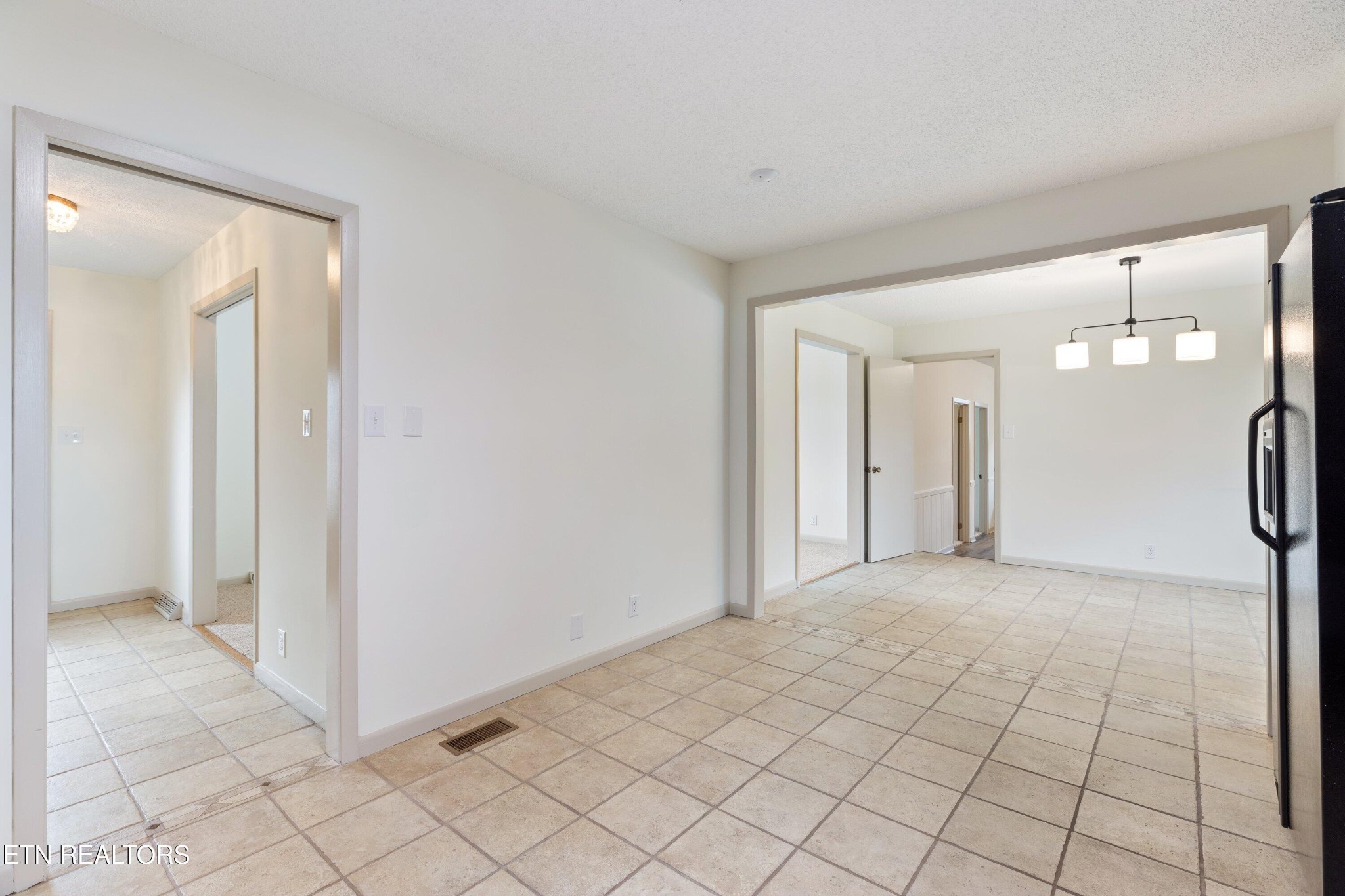 912 Naples Road Knoxville, TN 37923 - Photo 15 of 49 a view of a hallway with wooden floor