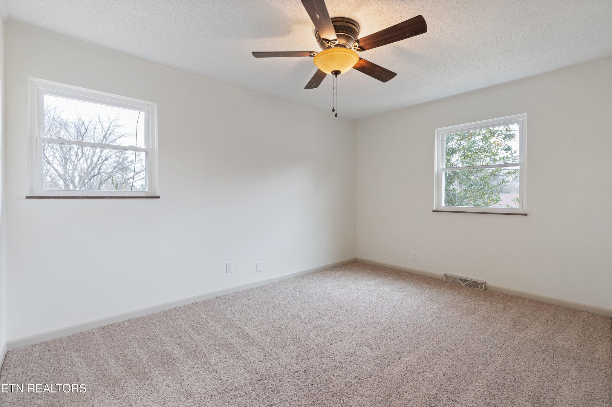912 Naples Road Knoxville, TN 37923 - Photo 22 of 49 a view of an empty room with a window